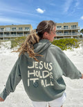 Jesus Holds It All Unisex Hoodie - Two & Gathered
