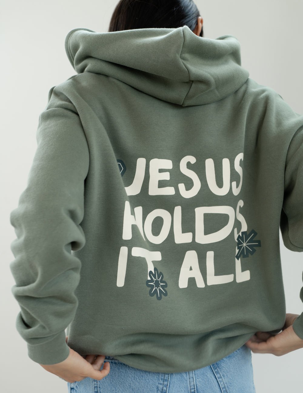 Jesus Holds It All Unisex Hoodie - Two & Gathered